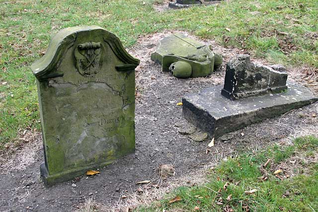 Gravestone in North Leith Graveyard  -  including a broken gravestone with a skull