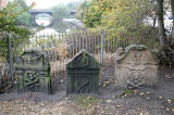 Gravestone in North Leith Graveyard  -  three gravestones with skulls and crossbones