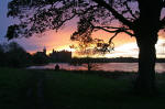 Distant view across Linlithgow Loch to St Michael's Parish Church and Linlithgow Palace