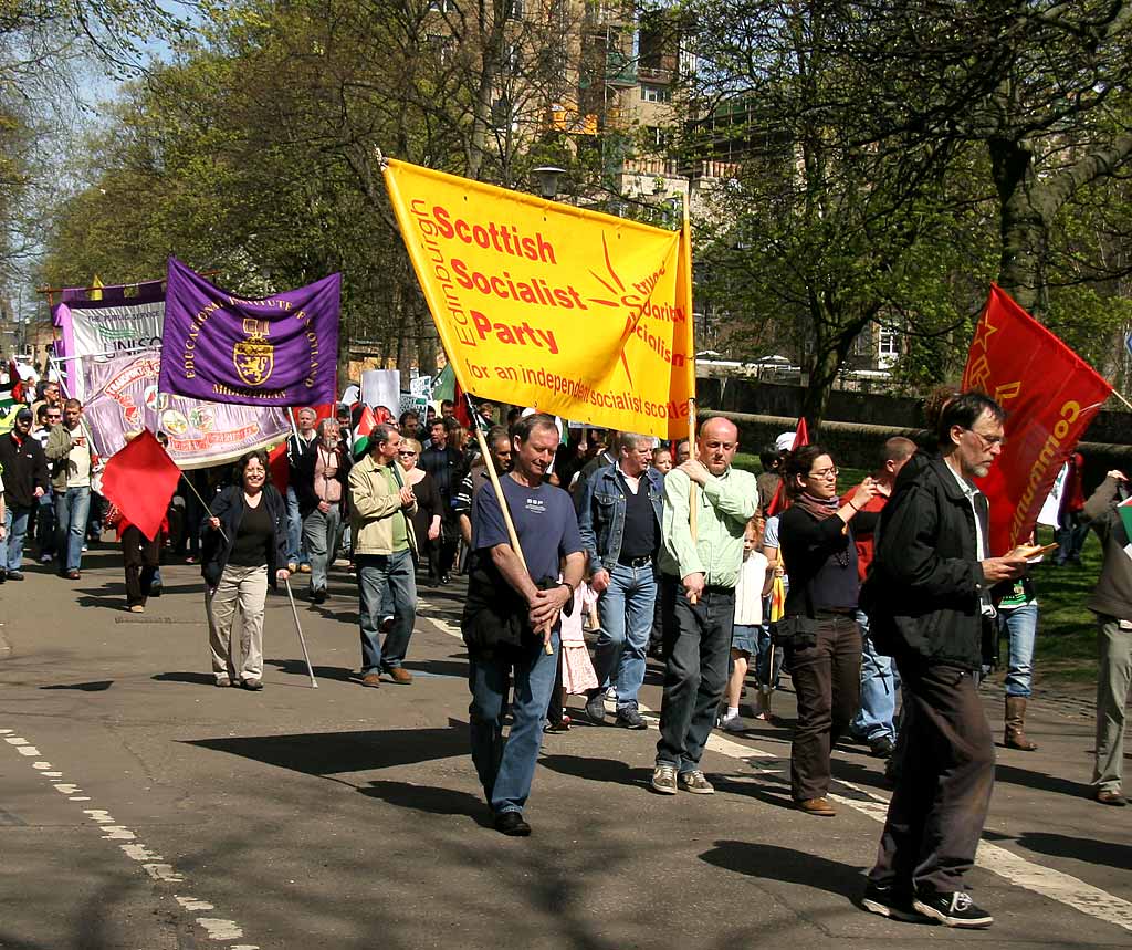 The march from Princes Street and George IV Bridge approaches the Meadows, down Middle Meadows Walk