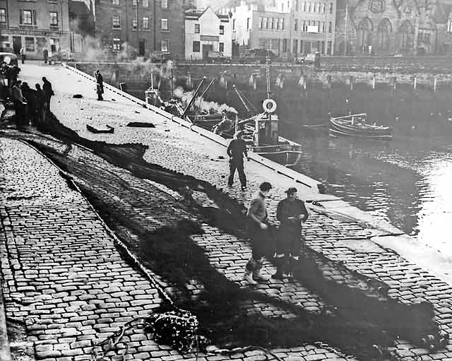 Fishing nets laid out on the slipway at Newhaven Harbour
