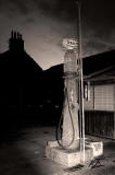 Old petrol pump at Peebles  -  black and white photograph, 2006