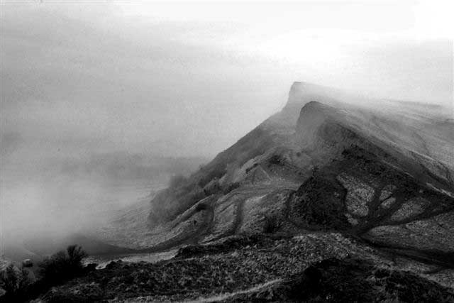 Salisbury Crags in the mist  -  photograph taken by Wullie Croal