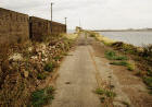 Looking along the old railway tract to the end of Western Breakwater, Granton Harbour  -  14 September 2003