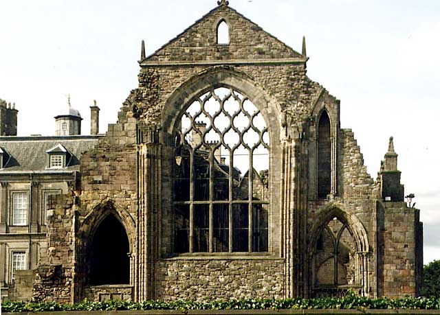 The Head Gardener, W ALexander, standing in front of Holyrood Abbey