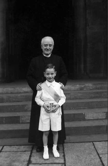 Canon Turner and Tony Ivanov, photographed outside St Patrick's Church, Cowgate,  in the 1950s