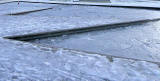 Ice on the shallow ponds outside the Scottish Parliament  -  December 2009