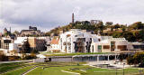 The Scottish Parliament Building  -  with Calton Hill in the background