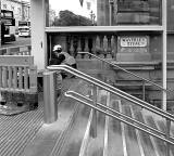 Waverley Steps with a worker completing the work following the installation of escalatorsr  -  February 2012