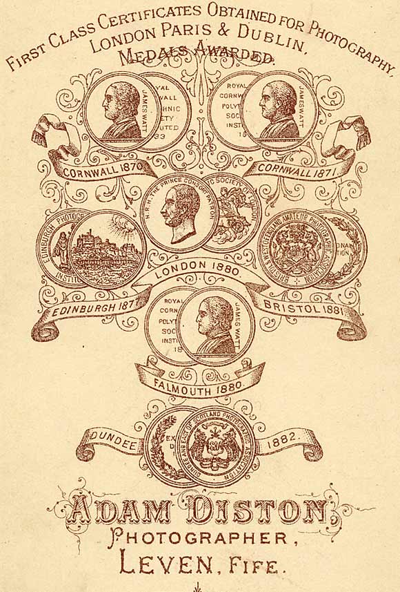 Zoom-in to the back of a carte de visite depicting 7 medals awarded to Adam Didton