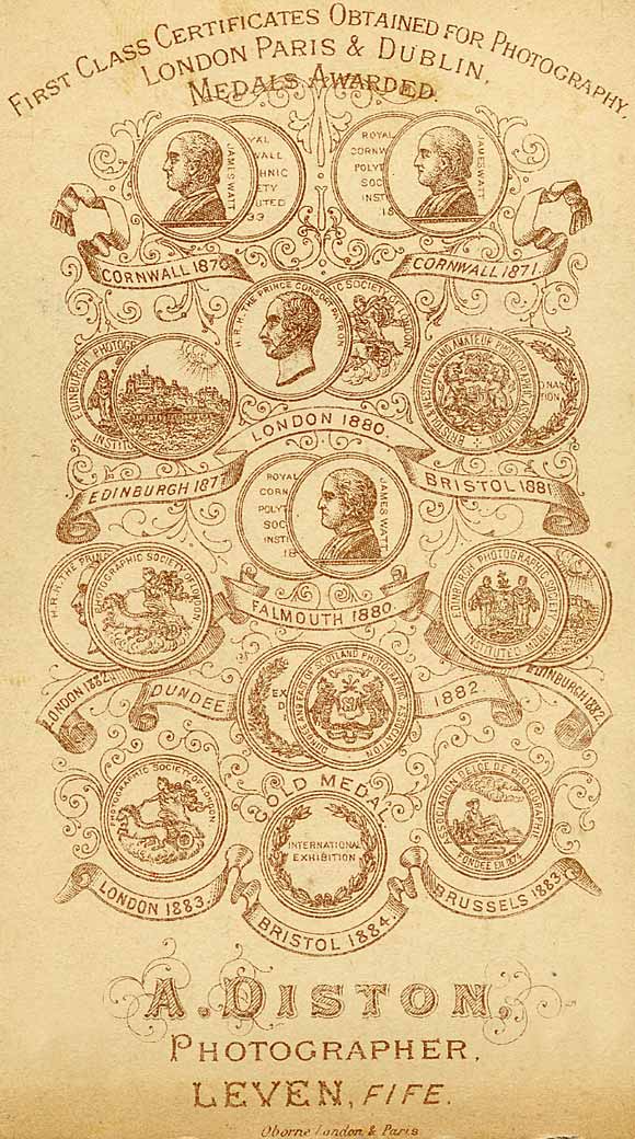 The back of a carte de visite, showing 12 Medals awarded to Adam Diston