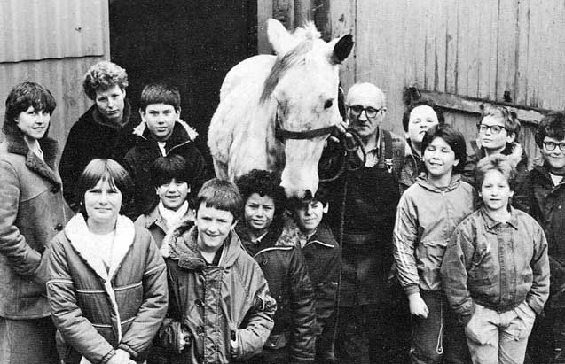 St Cuthbert's farrier, Jim Lee, and Silver with pupils at Tollcross School  -  March 1985