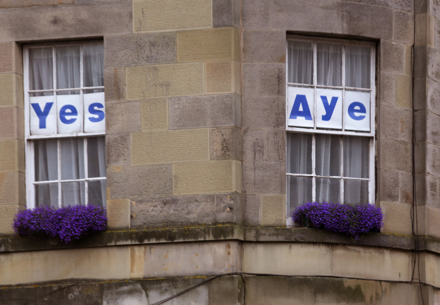 Photos taken in Edinburgh on the two days leading up to the Scottish Referendum Vote on 18 September 2014  -  Posters and Flower Boxes in Tenements at Nicolson Street, South Side