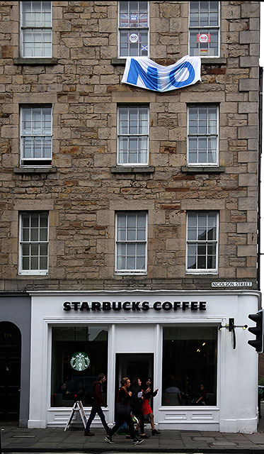 Photos taken in Edinburgh on the two days leading up to the Scottish Referendum Vote on 18 September 2014  -  'No' Banner and 'No' Posters on Tenement above Starbucks on the corner of Nicolson Street and East Crosscauseway, South Side