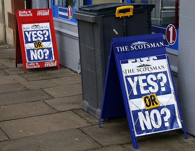 Photos taken in Edinburgh on voting day in the  Scottish Indepemdence Referendum on 18 September 2014  -  Newspaper Placard