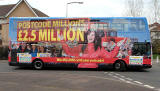 Lothian Buses  -  Adverts on Buses - Postcode Lottery advertised on a bus standing at Route 14 terminus
