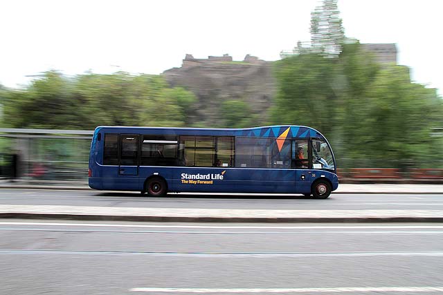 Lothian Buses  -  Route X25  -  Bus 902 approaches the National Galleires of Scotland in Princes Street