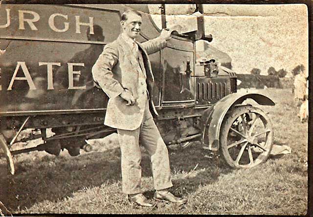 Andrew Beveridge Douglas standing beside a Duncans Cholcolates Albion van.