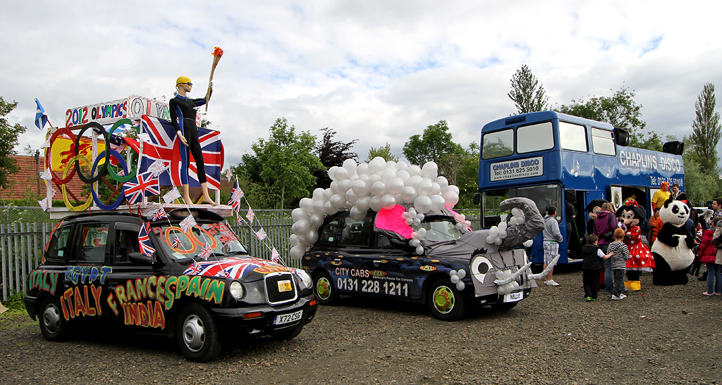 Edinburgh Taxi Trde Children's Outing, 2012  -  Two Decorated Taxis and the Disco Bus