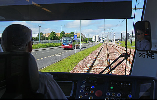 Edinburgh Tram Service  -  The tram approaches Edinburgh Park Station on its way to Edinburgh Airport  -  June 2014