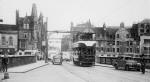 Commercial Street, Leith  -  A tram crosses the bridge over the Water of Leith, heading towards Newhaven and Granton.
