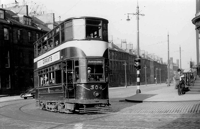 An old tram turns from York Place into North St Andrew Street, possibly in the early 1950s