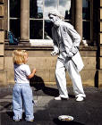 Edinburgh Festival 2003  -  White Mime Artist and Girl in the Royal Mile