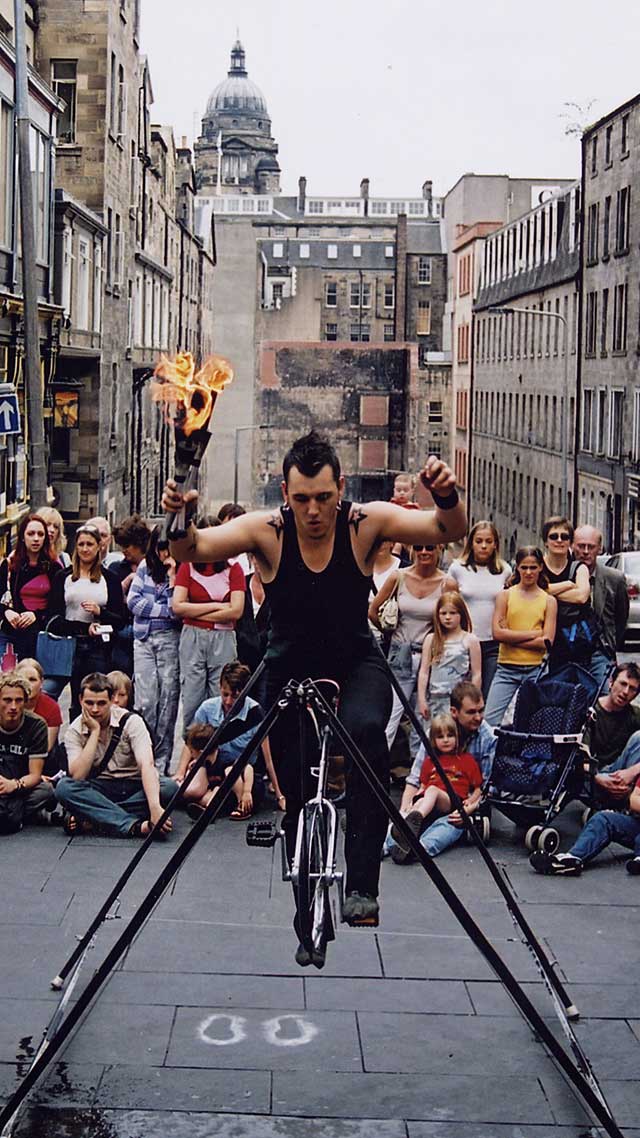 Edinburgh Festival 2003  -  Juggling Unicyclist in Hunter Square
