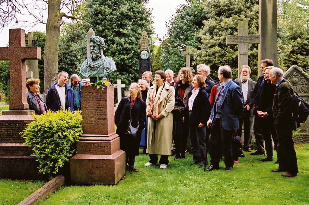 A Group from a Conference organised by the Scottish Society for the History of PHotography visits the gravestone of DO Hill to commemorate the 200th anniversary of his birth