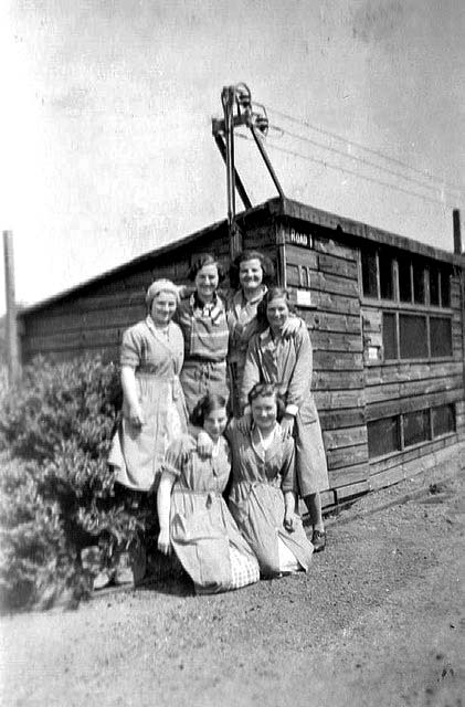 Six poultry assistants on Buttercup Poultry  Farm, Clermiston, Edinburgh - 1935