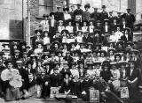 Ninety-one employees of JP Cochrane, golf club manufacturers outside their premises at Murano Street, Pilrig