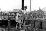 Dorothy and John Addison with chickens at 21 Fillyside Avenue, Portobello - 1941
