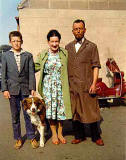 Ted, Douglas and Margaret Garry at the top of Wardlaw Street, Gorgie, on their way to a Coronation Party in 1953.