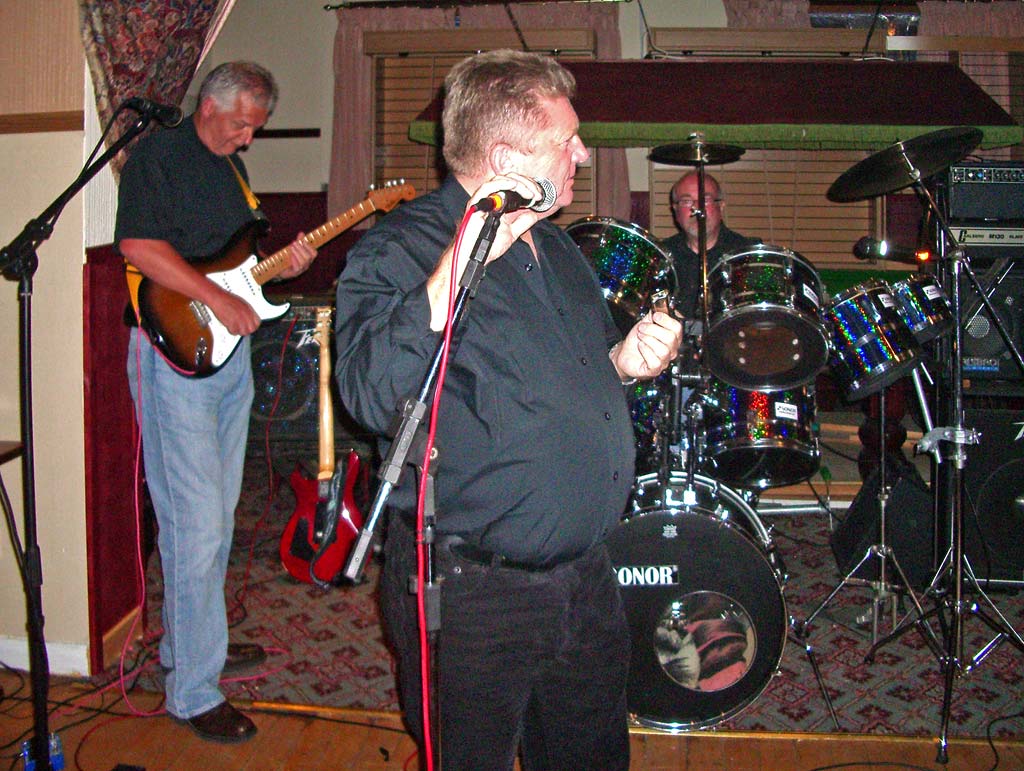 John (Dinky) on drums and Bruce on bass at a Plastic Meringue Reunion in 2007