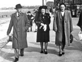 Great Aunt Aggie walks along Portobello Promenade in her fur coat, probably early-1950s