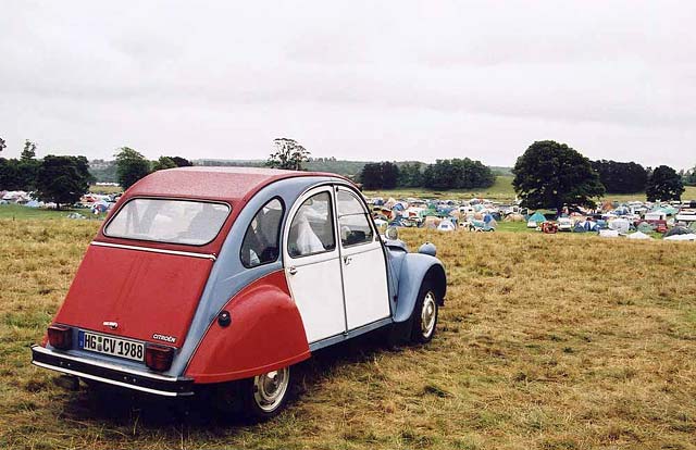 A Citroen 2CV in the centre of Kelso in the Scottish Borders  -  during the World 2CV Meeting held at Kelso, July 2005