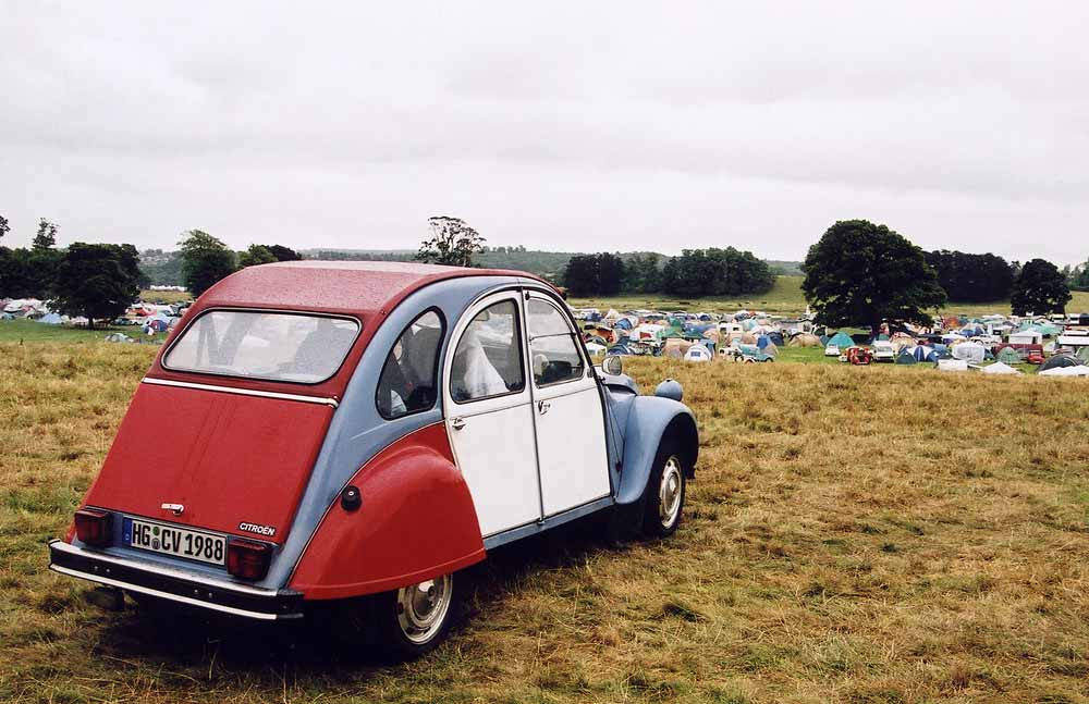 A Citroen 2CV in the centre of Kelso in the Scottish Borders  -  during the World 2CV Meeting held at Kelso, July 2005   -  Large photo