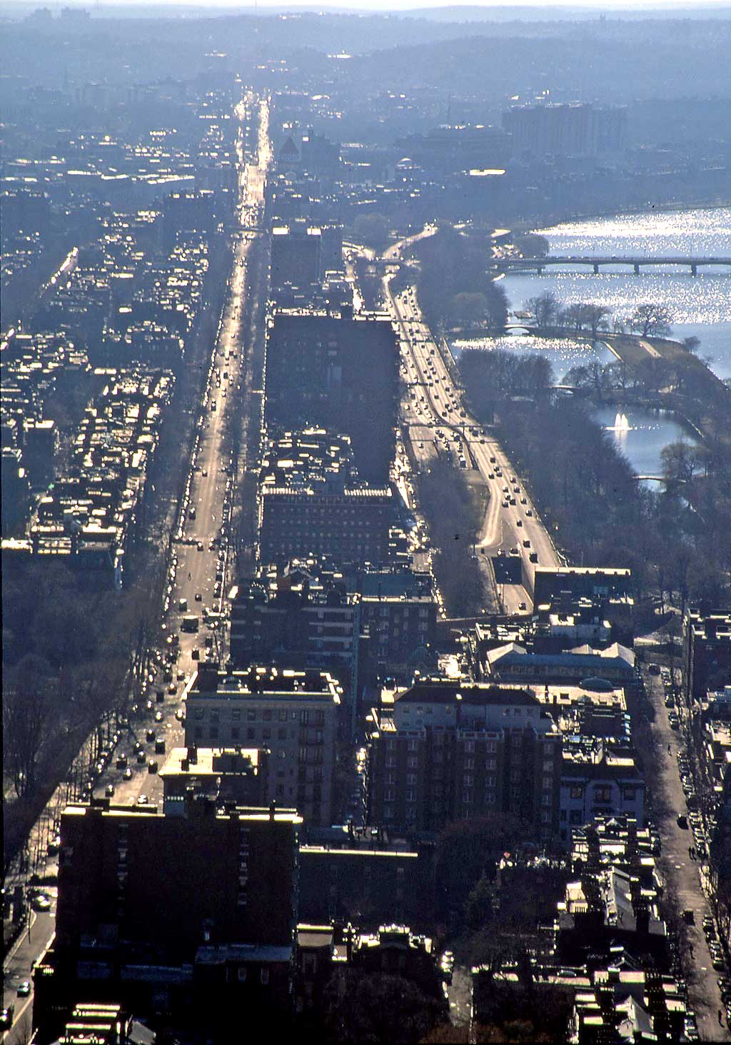 Boston:   looking west into the late afternoon sun:    Beacon Street  -  James J Storrow Memorial Drive  -  Charles River