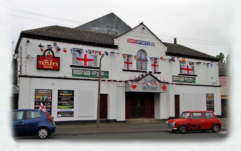 Bradford, Laisterdyke  -  Lyceum House, decorated in support of the English team in the Football World Cup being held in South Africa, June 2010