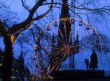 Big Wheel in Princes Street, with silhouettes, and Scott Monument behind  -  Christmas 2000..