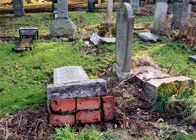 Photograph by Peter Stubbs  -  Edinburgh  -  January 2003  -  Warriston Gravestones Toppled 1