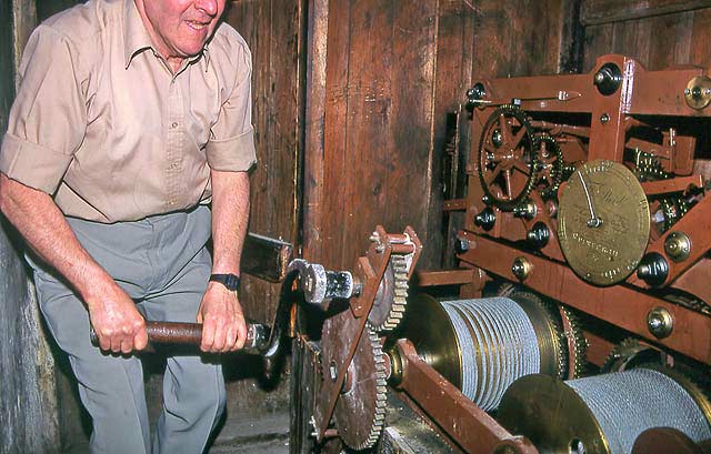 The clockwinder, winding the clock at St Andrew's & St George's Church  -  1993