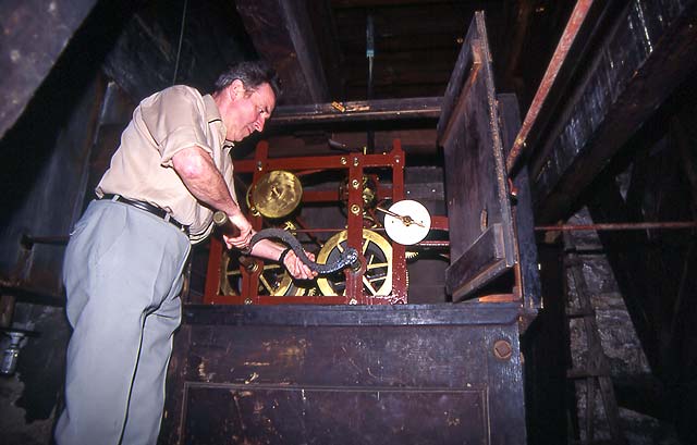 The clockwinder, winding the clock at St Stephens Church  -  1993