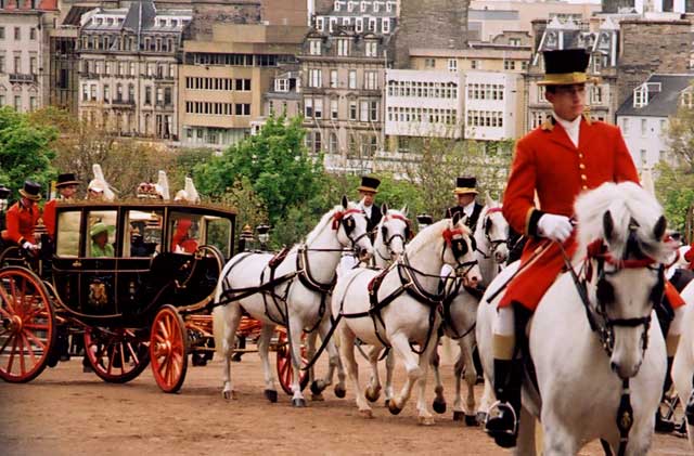Photoraph by Peter Stubbs  -  Edinburgh  -  May 2002  -  The Queen's Coach travelling up the Mound en route from Assembly Hall to Holyrood