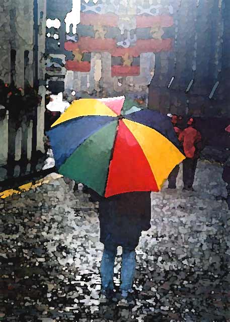 Photograph by Peter Stubbs  -  Edinburgh  -  August 2002  -  Umbrella in the Royal Mile