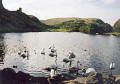 Photograph bt Peter Stubbs  -  Edinburgh  -  November 2002  -  Looking to the south-west across St Margaret's Loch towards the ruin of At Anthony's Chapel in Queen's Park