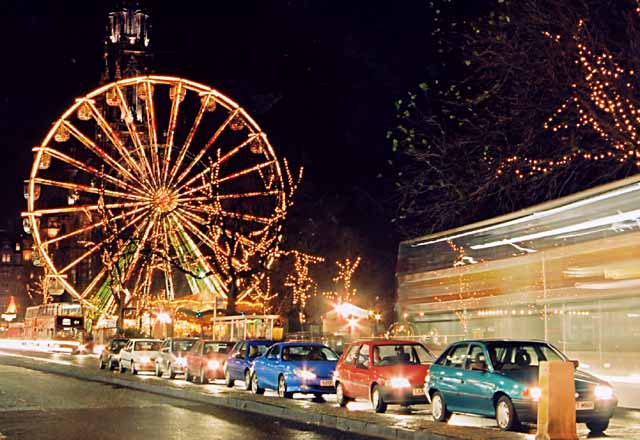 Photograph by Peter Stubbs  -  The Big Wheel and Princes Street traffic