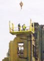 Photograph by Peter Stubbs  -  Edinburgh  -  December 2002  -  Dismantling the wall in the Cowgate
