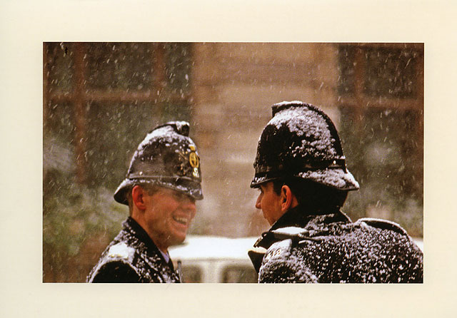 Christmas Card published by City of London Police, featuring my photograph of two Policemen standing in a snowstorm and chatting, near the Bank of England Head Office in the City of London