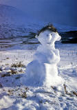 Postcard published by Johnston Financial Ltd, Edinburgh, featuring my photograph of a snowman near Rannoch Moor, Scotland